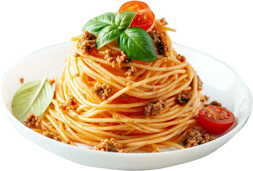 Spaghetti bolognese with minced meat, basil leaves, and cherry tomatoes in a white bowl.